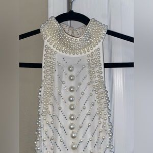 white pearl beaded cocktail dress.